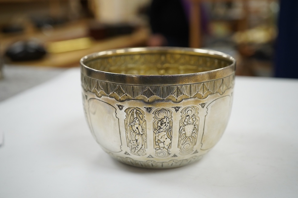 Two Victorian silver sugar bowls, a Victorian silver gilt sifter ladle and a repousse silver dish, 11.8oz. Condition - fair to good